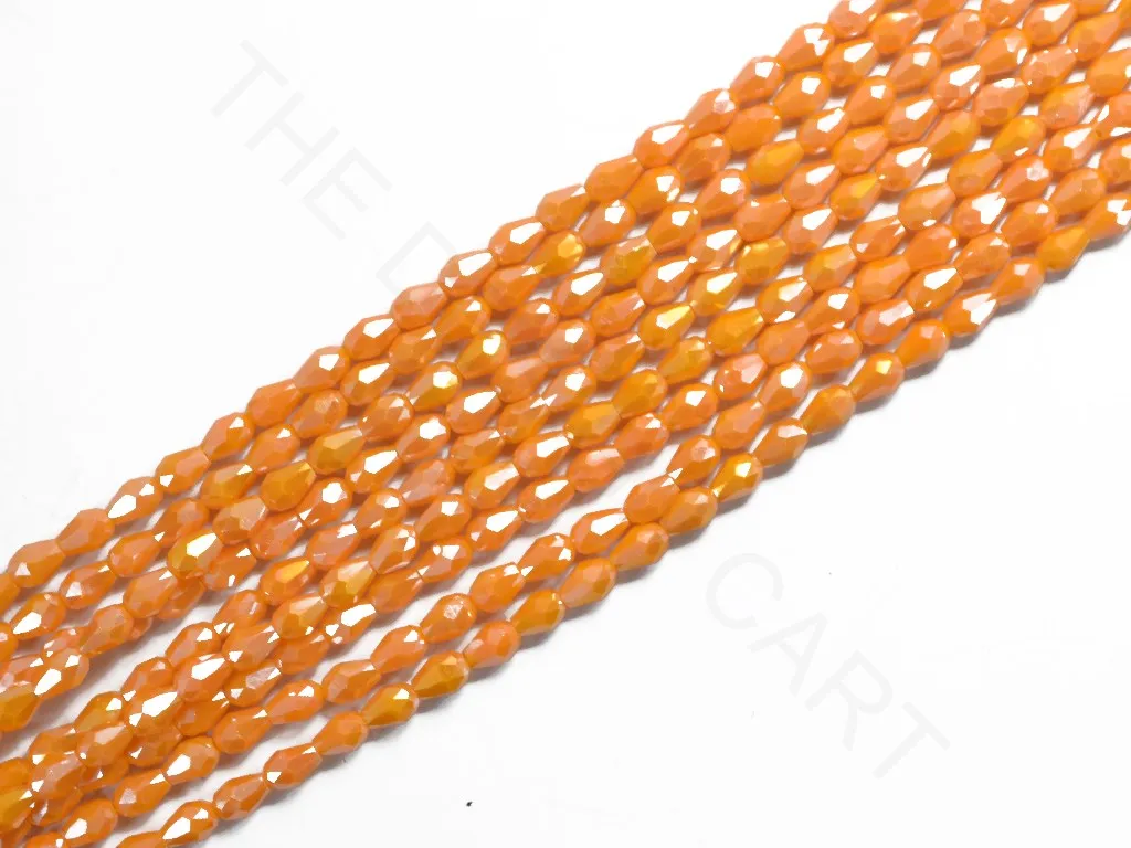 Lustrous Light Orange Opaque Drop / Briolette Crystal Beads